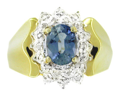 Oval Sapphire and Diamonds Estate Ring in 14 Karat Gold