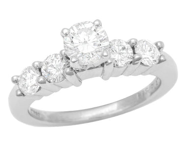 1960's Vintage Floating Diamonds Engagement Ring in Platinum