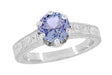 Art Deco Carved Filigree Scrolls Crown Tanzanite Solitaire Engagement Ring in 18 Karat White Gold