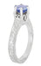 Art Deco Carved Filigree Scrolls Crown Tanzanite Solitaire Engagement Ring in 18 Karat White Gold