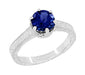 Art Deco Filigree Scrolls 1.5 Carat Blue Sapphire Engraved Solitaire Crown Engagement Ring in 18 Karat White Gold