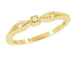 Retro Moderne Bow White Sapphire Band in Yellow Gold