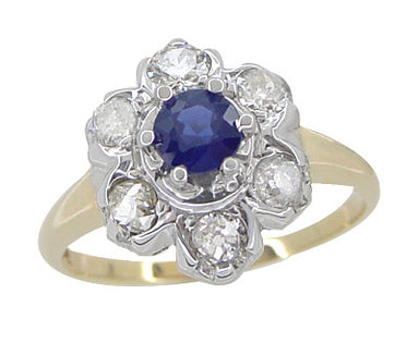 Mid Century Antique Floral Diamond and Blue Sapphire Ring in 14 Karat White and Yellow Gold