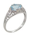 Side Fleur de Lys Filigree Detail on Blue Topaz Vintage Engagement Ring in White Gold - R799WBT