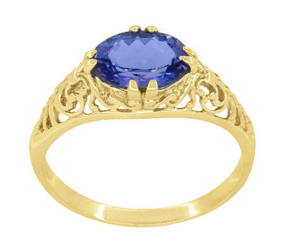 Yellow Gold Edwardian Fleur-De-Lys Filigree East to West Oval Tanzanite Ring - Item: R799YTA - Image: 3