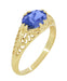 Yellow Gold Edwardian Fleur-De-Lys Filigree East to West Oval Tanzanite Ring