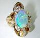 White Opal Ring set with Diamonds in 14 Karat Gold
